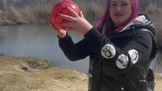 Play with ball on river