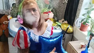 smoking girl play wirh foil balloons