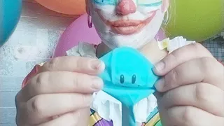 clown blowing blue smile balloon