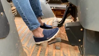 Watch me stomp and rev the hell out of the backhoe, and catch a peak at my dirty smelly feet