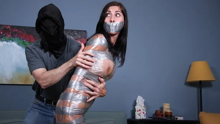 Glamorous Aubrielle Summer Meets Her Match When A Black-Hooded Man Confines Her Luscious Body In Duct Tape And Plastic Wrap!