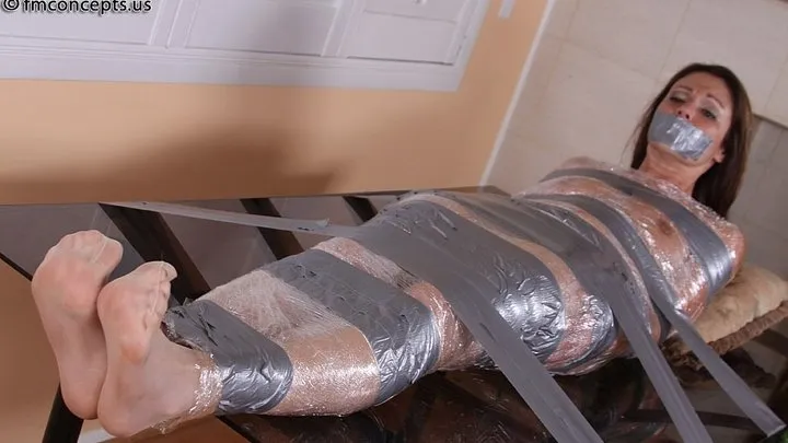 Sexy Samantha Ryan Is Wrapped in Plastic And Swaths Of Silver Duct Tape!