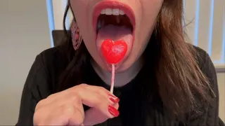 Mistress Alina Crunches on Heart-Shaped Lollipop