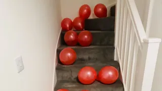 Stomping 25 red balloons up the stairs
