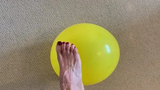 Barefoot balloon play and pop
