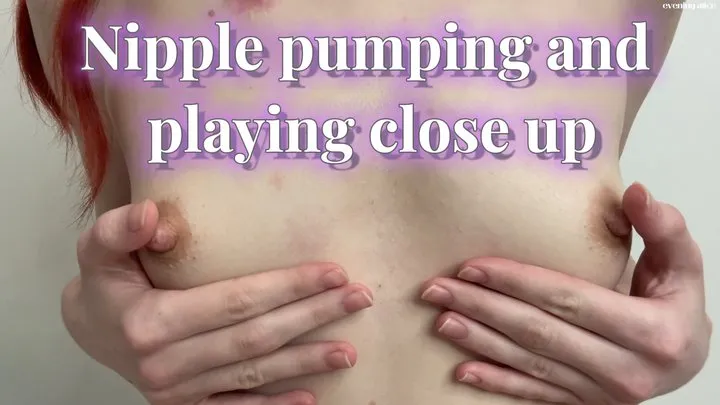 Nipple pumping and playing close up