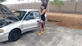 A very sexy mechanic wearing stockings and pumping a car pedal (3)