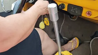 Driving with yellow flip flops