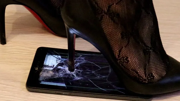 tablet crush under my black louboutin stilettos