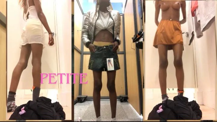 Skinny girl tries out different outfits in the dressing room