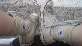 Fifi showing off her well worn ultra high top Converse All Stars from every angle