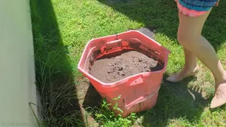 Fifi loses her patent nude heels in a container of sticky deep mud again