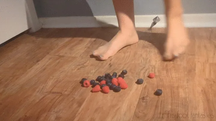 Fifi smooshing blueberries and raspberries in nude pantyhose