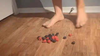 Fifi smooshing blueberries and raspberries in nude pantyhose