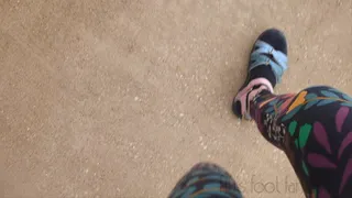 Fifi cranking in Teva sandals with black ankle socks and leggings