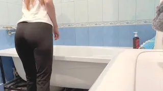 Step daughter takes a bath