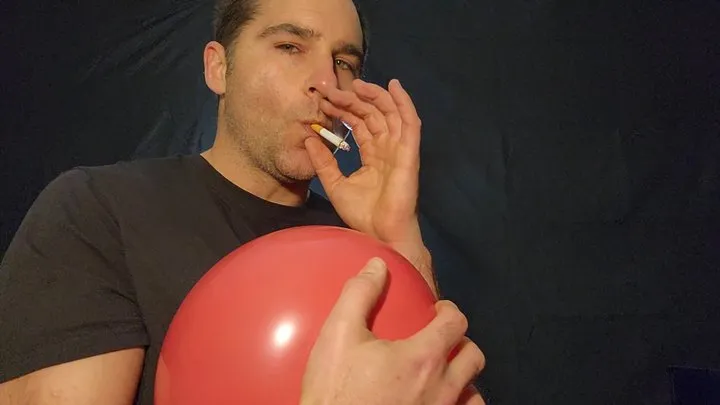 Guy smoking a cigarette and popping a red balloon