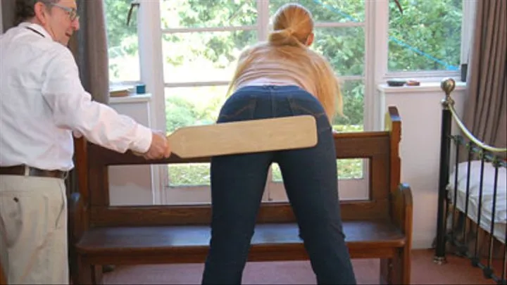 Tight denim jeans, Amelia Rutherford's curvy bottom and a wooden paddle!