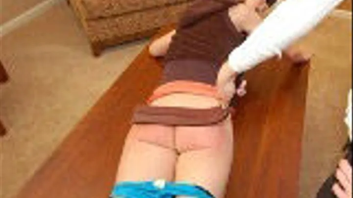 Caroline Harper complains about being spanked, and gets strapped by Alison Miller!