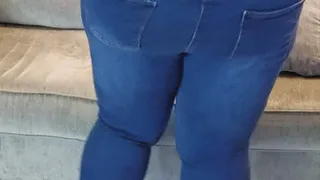 Soles and Butt in Jeans Bent Over