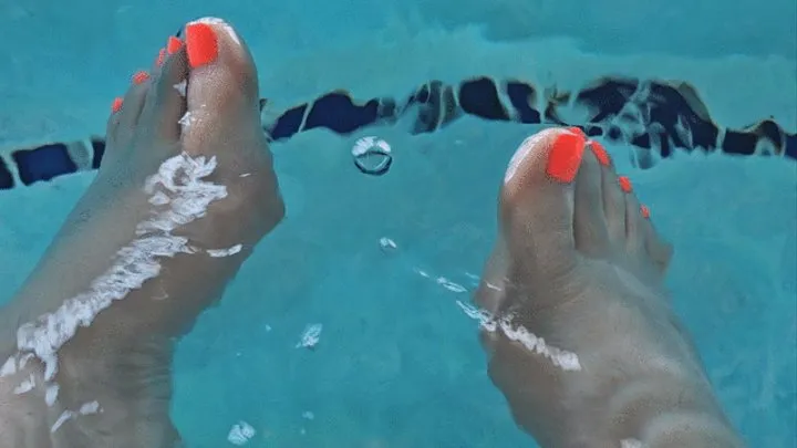 Neon toes at the pool closeup