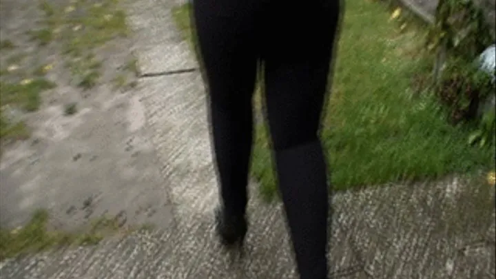 big legs in skintight black jeans and high heels