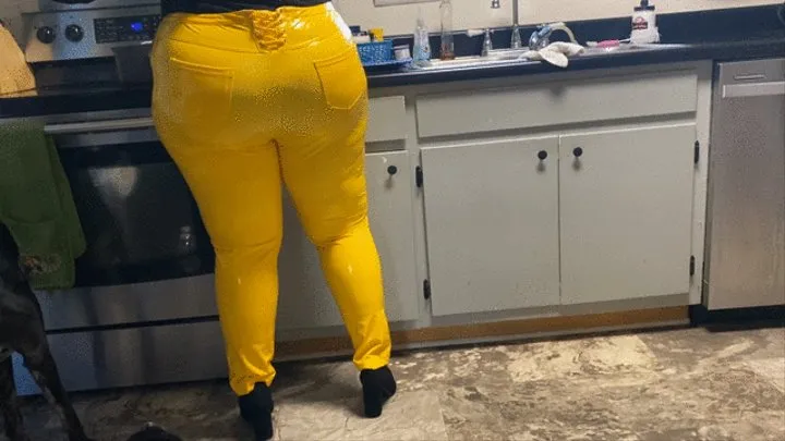 Siri in skintight yellow pvc pants and highheels in kitchen