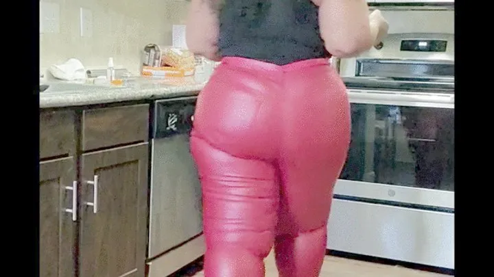 Miss Strongbutt in skintight red wetlook Jeans pants and high heels works in the kitchen