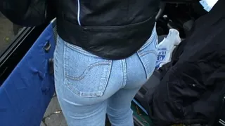 Blackhaired girl in skintight blue Mustang Stretchjeans and on high heels 1