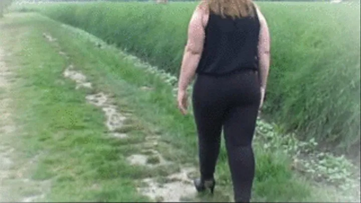 Blond Hair, black jeans, outdoor walk on high heels