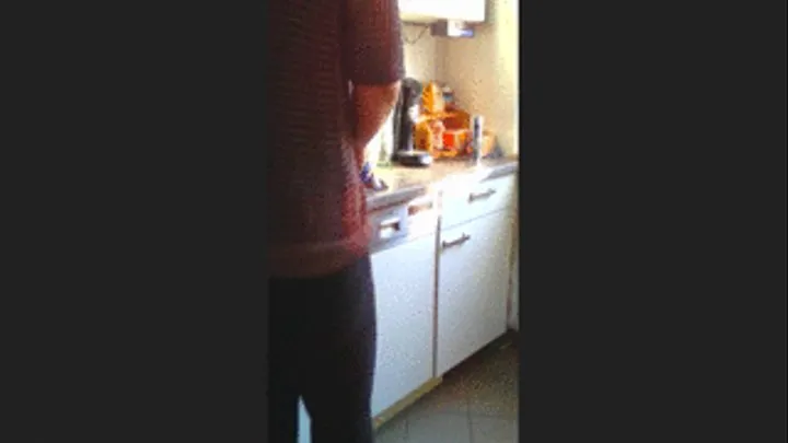 Blond Hair, black jeans, kitchen work on high heels