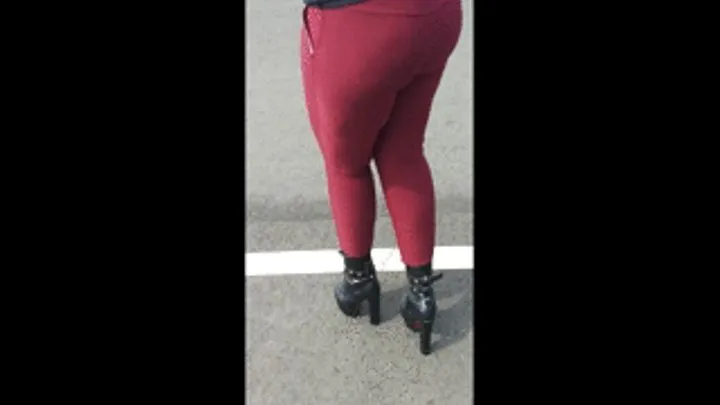 Big butt Deea in skintight red pants walking