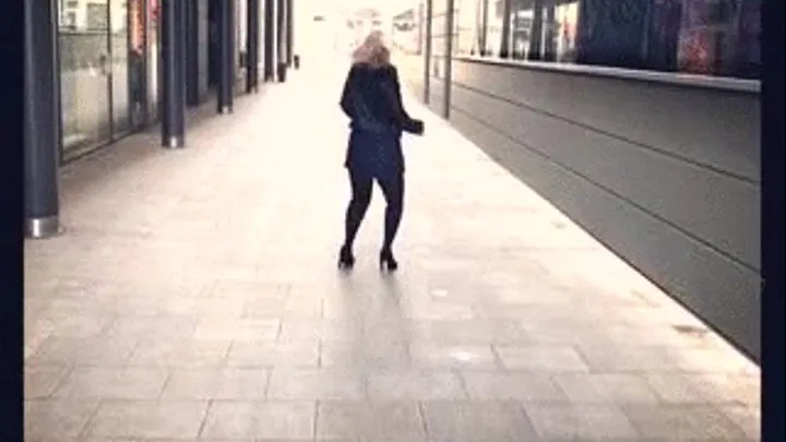 Big butt walking in skintight black torn stretch jeans and high heels 1