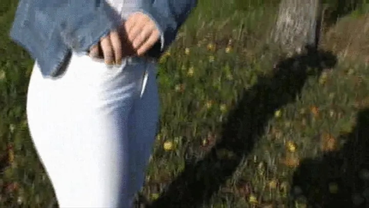 Hot Brunette in skintight white Stretchjeans 1