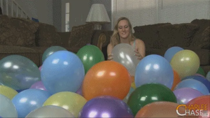 Gemma Pops a Sea of Balloons