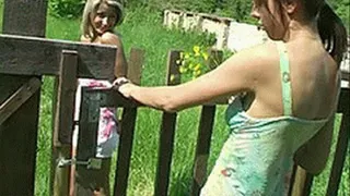 Young lesbians prance nude in the garden before dildo masturbation - part 1