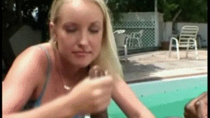 Blond milf has fun by the pool