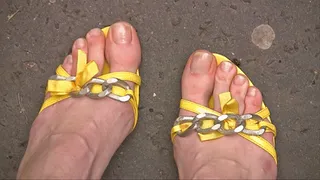 Hania's too small yellow sandals