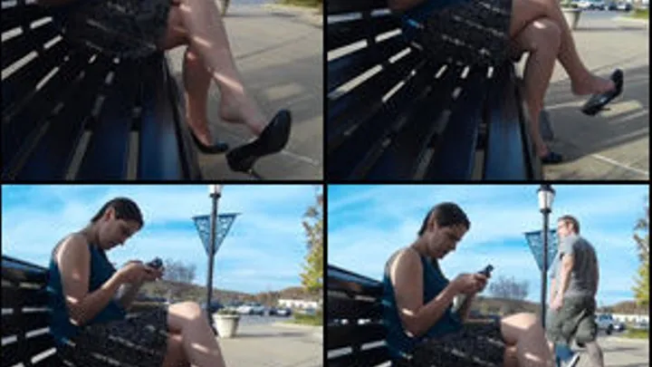 Addie Juniper Dangling Black Pumps on Public Bench