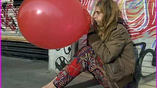 Dreadlocked Hippie Girl Skye Blows up a Balloon until it Pops