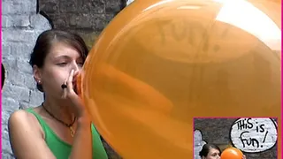 Kira blows up a Balloon and pops it