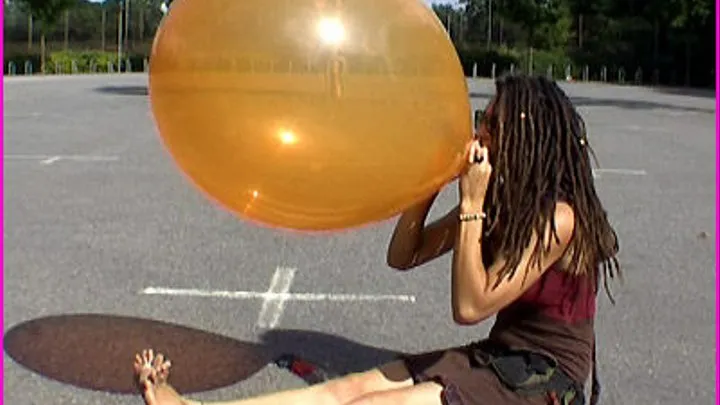 Tara blows up a Balloon until it Pops