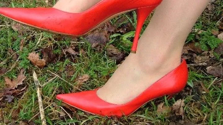 Red Sergio Rossi heels getting muddy