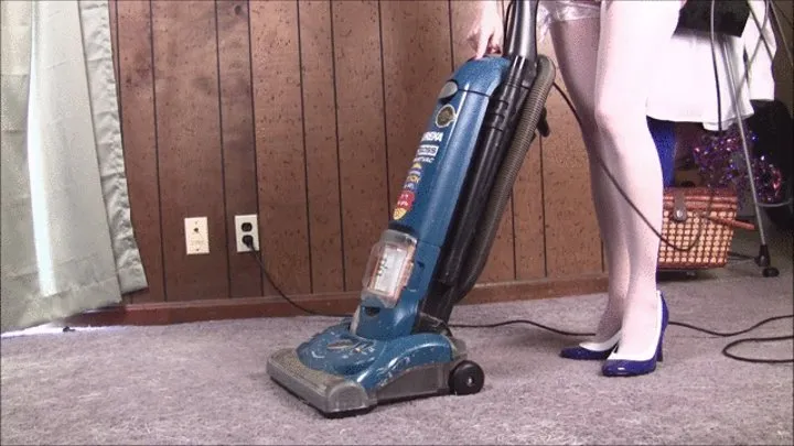 Mindy Daniels vacuuming