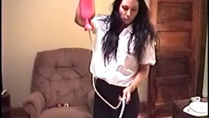 A humiliating ball tied enema for Taylor!