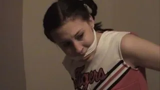 Cheerleader Astrid struggles blindfolded!