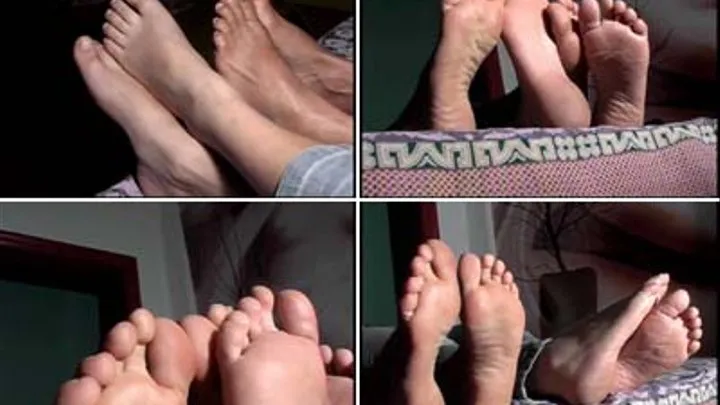 FEET SOLES ON BED