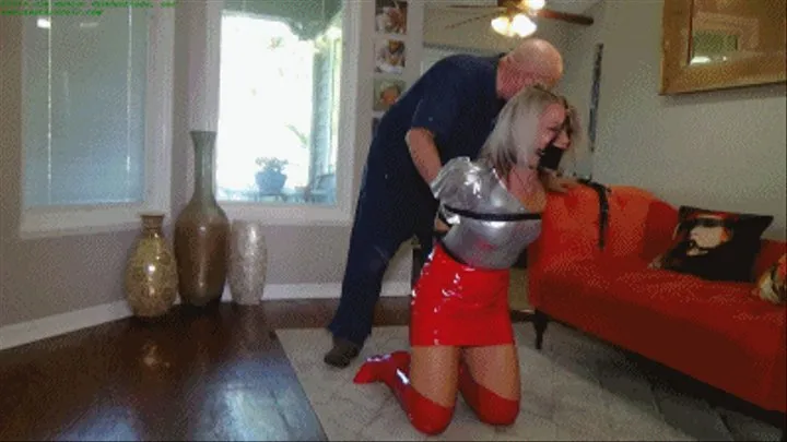 Hapless bimbo left helplessly bound in leather belts