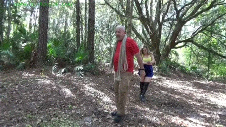 Busty blond bimbo dragged through the woods and tied to a tree