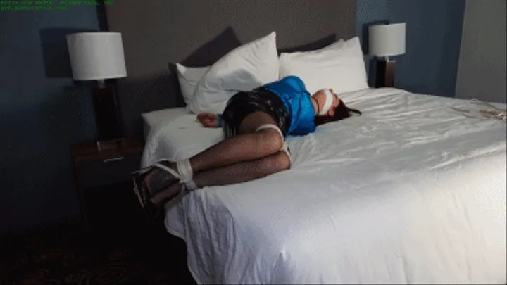 Helpless hogtied her hotel room to stop her from closing the deal